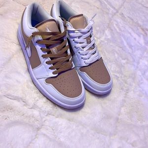 Tan and white lows Jordan’s.